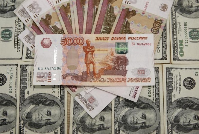 Liên tiếp bị trừng phạt, Nga đe dọa 'rời xa' đồng đô la Mỹ Ảnh minh họa: IBT
