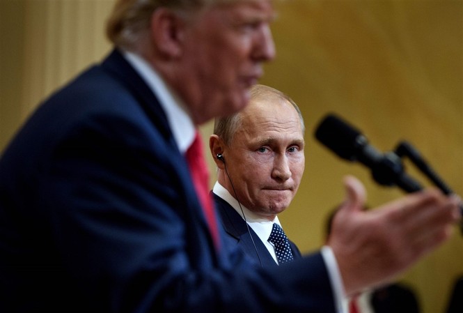 Quan chức Nga: Mỹ muốn rời Hiệp ước INF vì giấc mơ thống trị Tổng thống Nga Vladimir Putin và Tổng thống Mỹ Donald Trump. Ảnh: AFP
