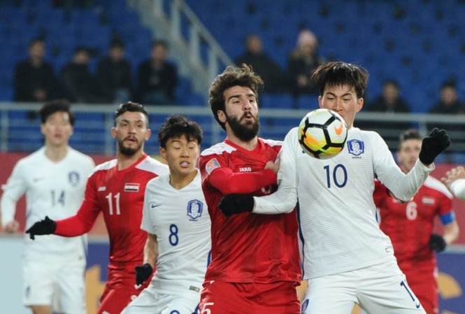 BẢN TIN Thể thao: U23 Syria bị nghi gian lận tuổi U23 Syria (áo đỏ) bị nghi gian lận tuổi.