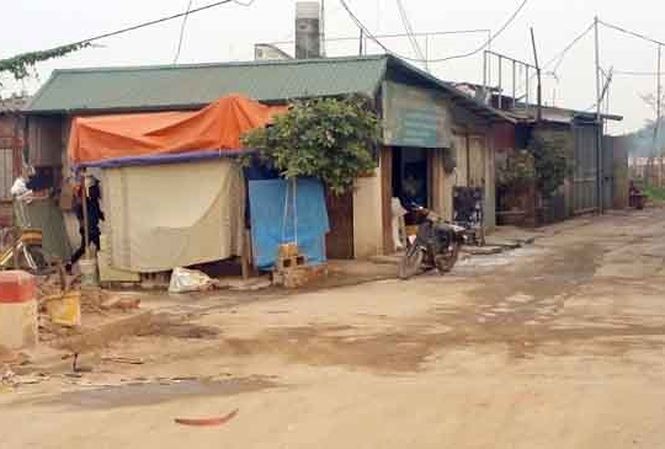 Chủ tịch Hà Nội: ‘Xã hội đen’ lấn chiếm đất kiếm đến cả tỷ đồng Những ngôi nhà xây dựng không phép ở bãi giữa sông Hồng. Ảnh: Trần Quý