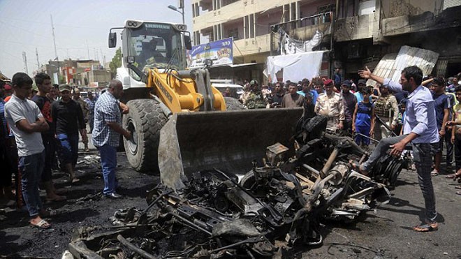 Đánh bom liên hoàn ở Iraq, gần 90 người thiệt mạng Hiện trường vụ đánh bom ở Sadr City, Baghdad, Iraq hôm 11/5