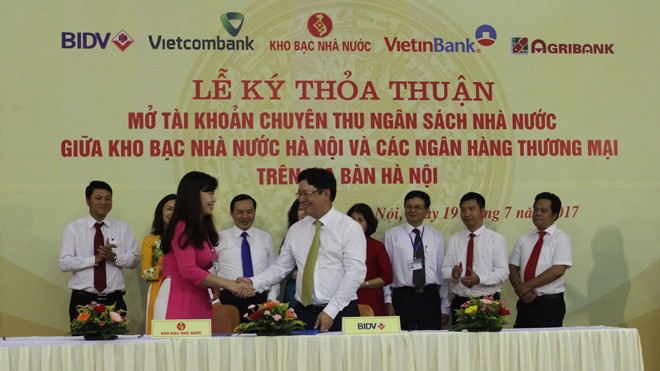 Ký thỏa thuận phối hợp thu ngân sách nhà nước trên địa bàn Hà Nội Ký thỏa thuận phối hợp thu ngân sách nhà nước trên địa bàn Hà Nội