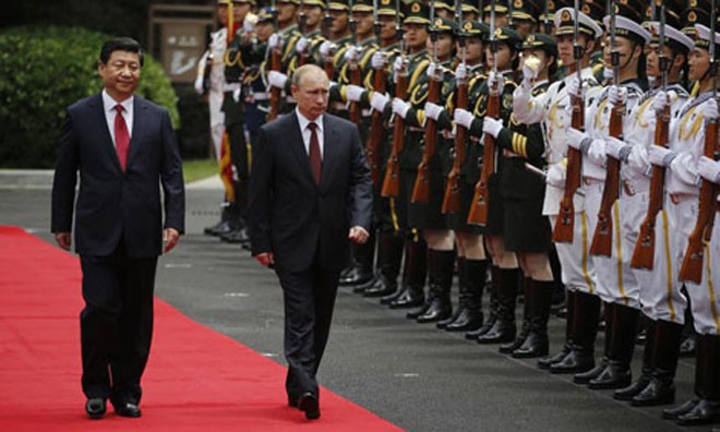 Putin thăm Trung Quốc: Đồng minh hay đối thủ? Lễ đón chính thức Tổng thống Putin diễn ra tại Thượng Hải vào hôm qua.