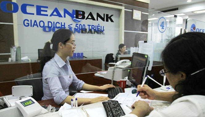 Tái cơ cấu ngân hàng, bao lâu? Tái cơ cấu ngân hàng hiện bị cho là hơi chậm. Ảnh: Như Ý.