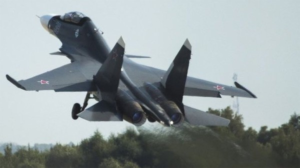 Quân đội của Putin sẽ diệt IS tốt hơn hẳn Mỹ? Nga có 4 chiến đấu cơ SU-30 trong số 34 máy bay triển khai tới Latakia thuộc Syria. Ảnh: AP.
