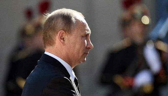 Nga quyết giành thắng lợi trước phương Tây ở Syria Chiến dịch không kích tại Syria đưa Tổng thống Vladimir Putin trở lại sân khấu chính trị quốc tế. Ảnh: AFP.