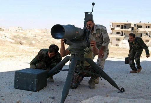 Phe đối lập Syria nhận tên lửa chống tăng từ Mỹ Nhóm đối lập ở Syria sử dụng tên lửa TOW. Ảnh Eaworldview.