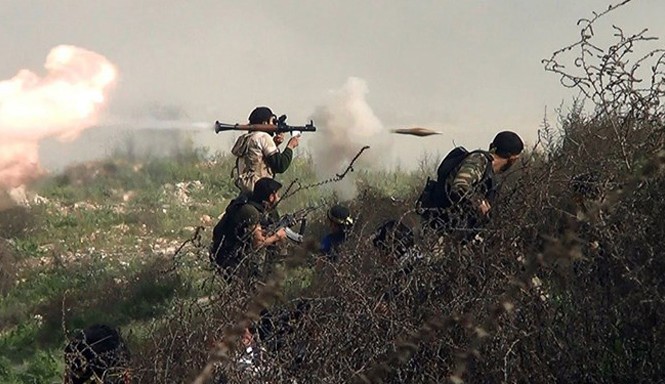 Bản tin 20H: Chiến đấu cơ tấn công 6 thị trấn Syria Chiến binh thuộc lực lượng phe đối lập Syria. Ảnh: msnbc.com.