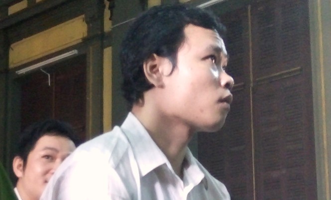 Dùng cờ lê sát hại đồng nghiệp trên biển Bùi Thanh Nam tại phiên toà. Ảnh: Tân Châu.