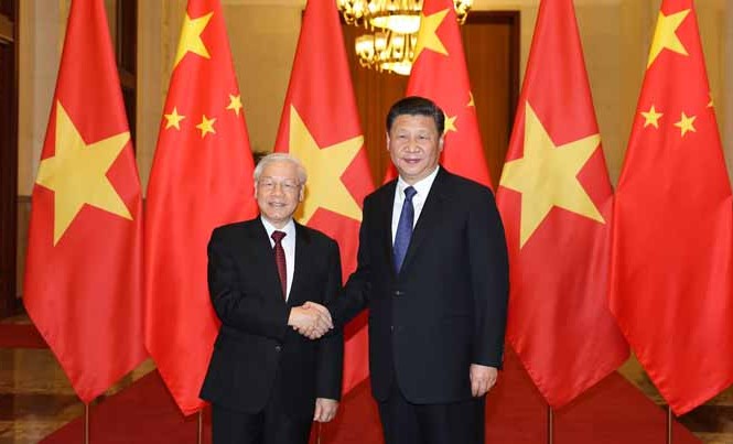 Việt – Trung ký 15 văn kiện hợp tác Tổng Bí thư Nguyễn Phú Trọng và Tổng Bí thư, Chủ tịch Trung Quốc Tập Cận Bình tại Đại lễ đường Nhân dân Trung Quốc. Ảnh: TTXVN.