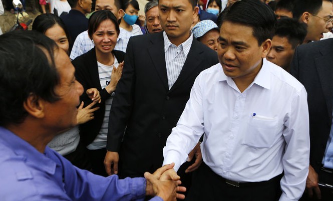 Ngành thanh tra “thiếu quyết liệt, chậm đổi mới” Chủ tịch UBND TP Hà Nội Nguyễn Đức Chung gặp gỡ, đối thoại với bà con nhân dân xã Đồng Tâm ngày 22/4/2017. Ảnh: Như Ý.