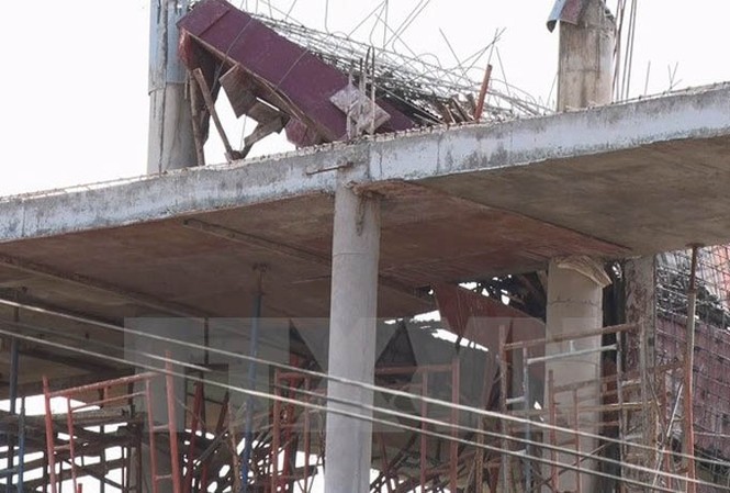 Bản tin 14H: Sập giàn giáo xây biệt thự, hai người chết Ảnh minh họa: Nam Thái/TTXVN.