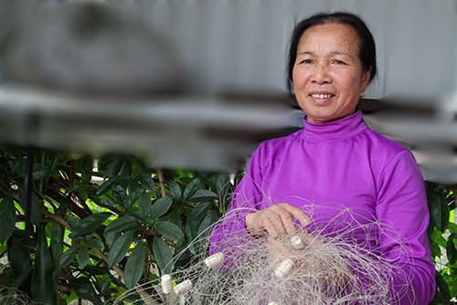 Ký ức đổi đời nhờ bắt được cá sủ vàng cực quý Bà Tâm bên tấm lưới cũ từng bắt được cá sủ vàng 23 năm trước.