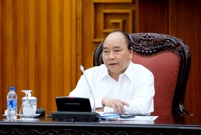 Thủ tướng yêu cầu loại bỏ chi phí bất hợp lý của trạm BOT Thủ tướng Nguyễn Xuân Phúc phát biểu tại cuộc họp