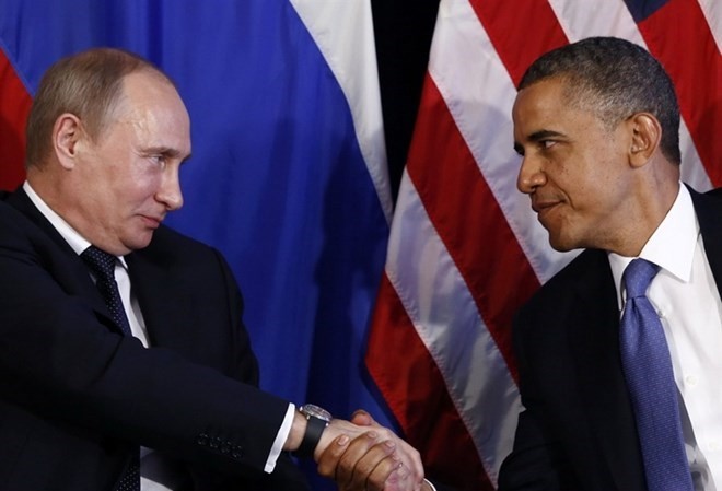 Bản tin 20H: Nga - Mỹ nhất trí trao đổi thông tin về Ukraine Tổng thống Mỹ Obama (phải) và Tổng thống Nga Putin có thể gặp nhau khi dự Hội nghị APEC.