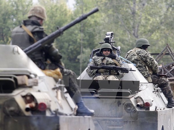Bản tin 20H: Ukraine sẽ nhập tịch cho lính đánh thuê Binh sỹ Ukraine. Nguồn: AFP/TTXVN
