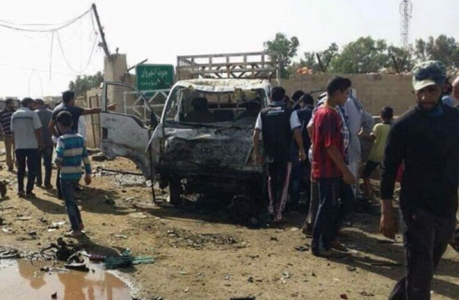 Bản tin 20H: Đánh bom xe tại Iraq, ít nhất 24 người thiệt mạng Hiện trường vụ đánh bom. (Nguồn: RT)