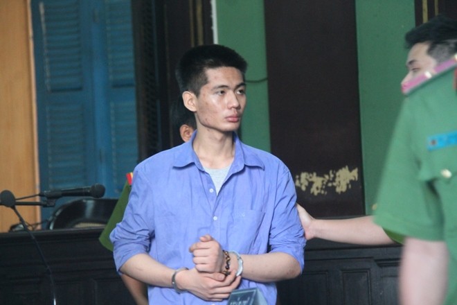 Đâm chết 2 người vì bênh bạn gái Nguyễn Đức Tài tại phiên tòa hôm nay 11/7. Ảnh: Tân Châu