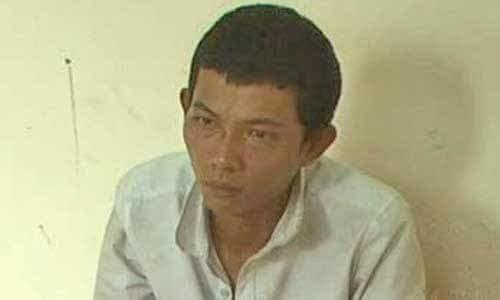 Tạm giữ nghi can tống tiền doanh nghiệp Nghi can Cơ tại trụ sở cảnh sát.