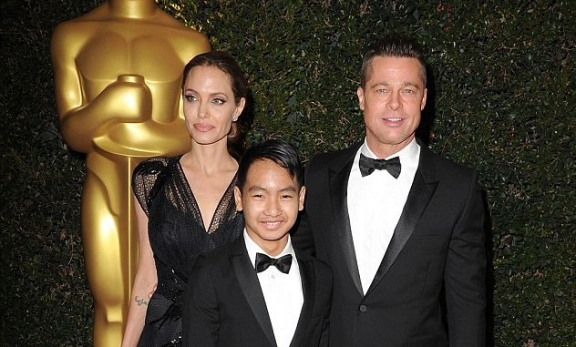 FBI xem xét điều tra cáo buộc Brad Pitt bạo hành con Vợ chồng Angelina - Brad và con trai cả Maddox.