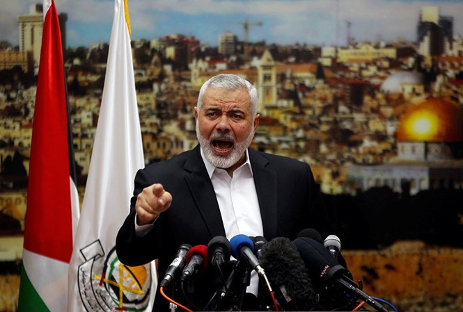 Hamas kêu gọi nổi dậy, Israel triển khai quân đội sau tuyên bố về Jerusalem Lãnh đạo nhóm Hamas Ismail Haniyeh. Ảnh: Reuters