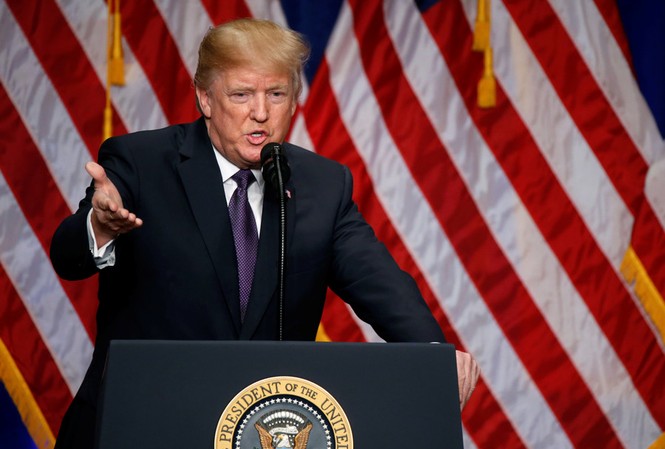 Nga: 'Chiến lược quốc gia của Trump đe dọa thế giới' Tổng thống Mỹ Donald Trump công bố chiến lược an ninh quốc gia mới hôm 18/12. Ảnh: Reuters