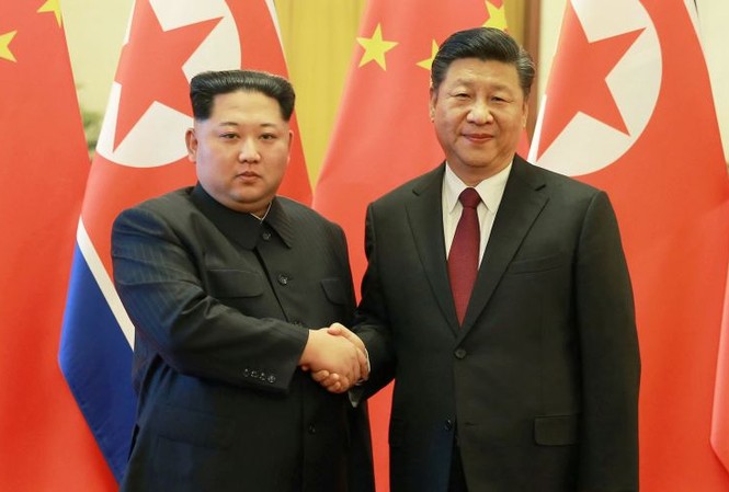 Triều Tiên muốn tham gia Vành đai Con đường của Trung Quốc? Chủ tịch Triều Tiên Kim Jong-un và Chủ tịch Trung Quốc Tập Cận Bình tại cuộc gặp ở Bắc Kinh vừa qua. (Ảnh: Reuters)
