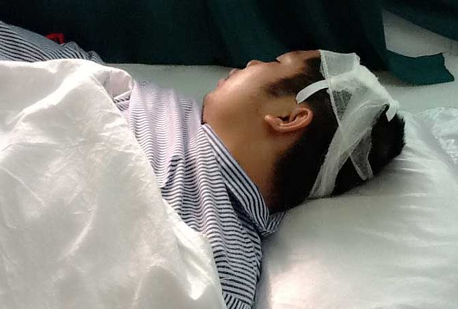 Điều tra vụ chủ nợ bị chém vào đầu Anh Lê Đức Khanh đang điều trị trong bệnh viện.