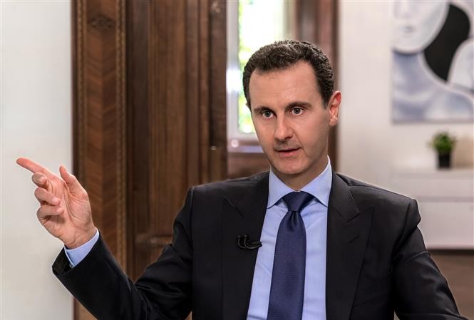 Bản tin 20H: Mỹ trừng phạt 2 công ty 'cung cấp vũ khí' cho Syria Tổng thống Syria Bashar al-Assad. (Nguồn: AFP/TTXVN)