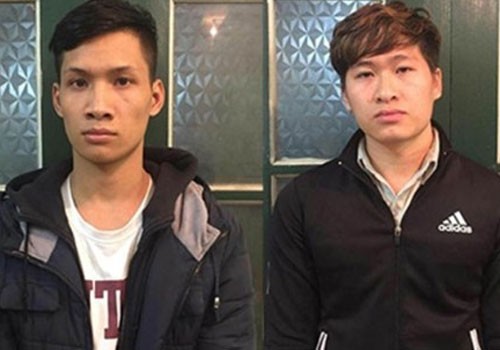 Nam sinh bán giấy khám sức khoẻ giả qua Facebook Hai bị can tại cơ quan công an. Ảnh: Trung Việt.