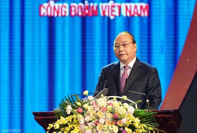 Chăm lo, bảo vệ quyền lợi để người lao động tin tưởng và gắn bó Thủ tướng Nguyễn Xuân Phúc phát biểu tại Lễ kỷ niệm (ảnh Q.H)