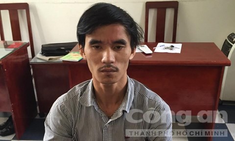 Bắt cóc con bạc đòi nợ 2 tỷ đồng tiền thua bạc trên mạng Đối tượng Lê Phạm Trung Thông tại cơ quan công an - Ảnh: Thiên Long