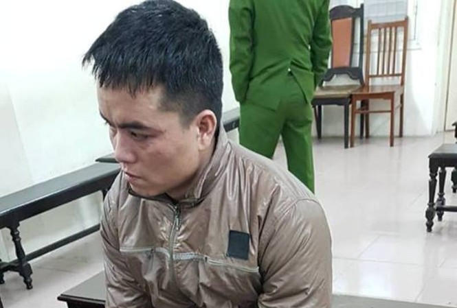 Chém vợ tử vong vì bỏ về nhà mẹ đẻ Nguyễn Ngọc Nhẫn tại tòa.