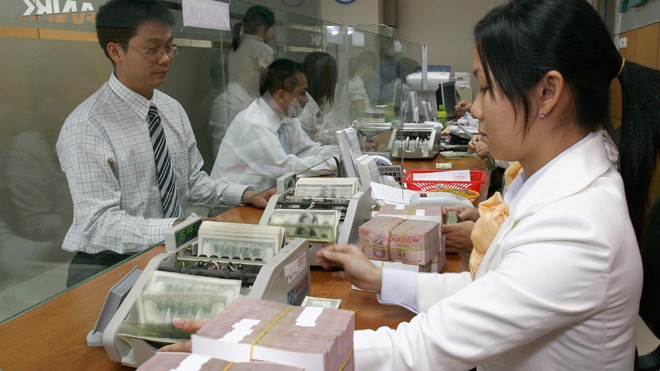 Tỷ giá không lấy dao mổ kiến Năm 2014 tỷ giá điều chỉnh không quá 1%