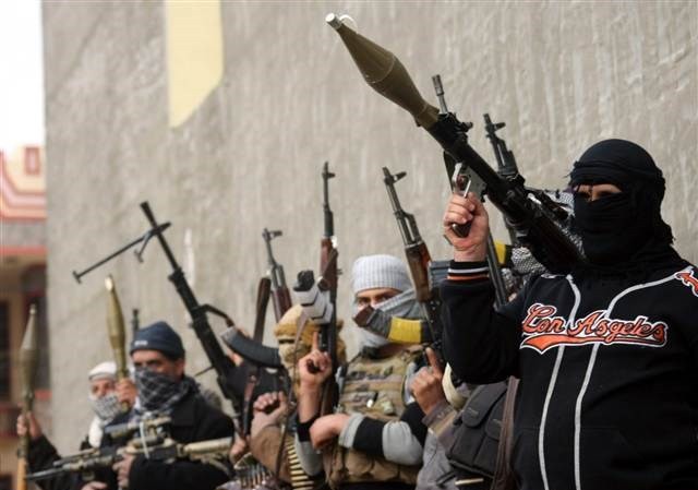 Quân đội Iraq ồ ạt tấn công phiến quân ISIL Các tay súng của ISIL tại Fallujah, Iraq. (Nguồn: EPA)