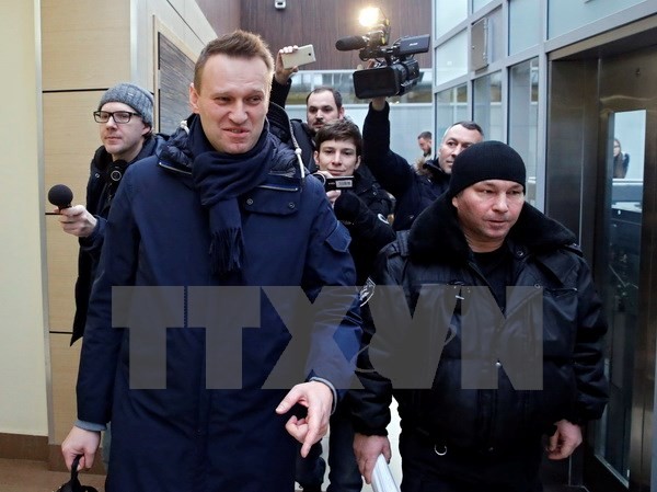 THẾ GIỚI 24H: Cảnh sát Nga bắt thủ lĩnh đối lập Navalny Ông Alexei Navalny bị áp giải tại Moskva ngày 31/1 vừa qua. (Ảnh: EPA/TTXVN)