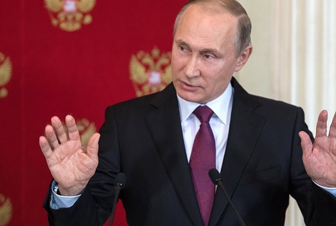 Tổng thống Putin: Tình hình Syria rất giống Iraq năm 2003 Tổng thống Nga Vladimir Putin. Ảnh: Sputnik