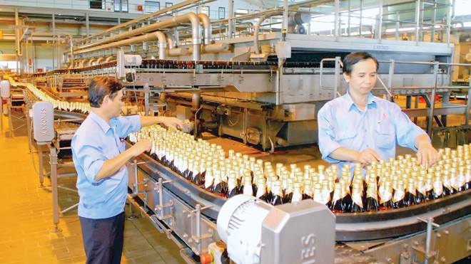 Thoái vốn doanh nghiệp Nhà nước: Lo thất thoát tỷ đô la Dây chuyền sản xuất của Sabeco. Ảnh: Cao Thăng.