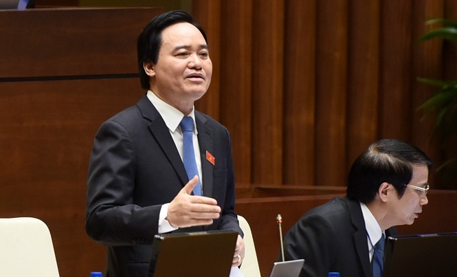 Đau lòng khi giáo viên phải đi 'tiếp khách' Bộ trưởng Phùng Xuân Nhạ tại phiên chất vấn. Ảnh: Như Ý.
