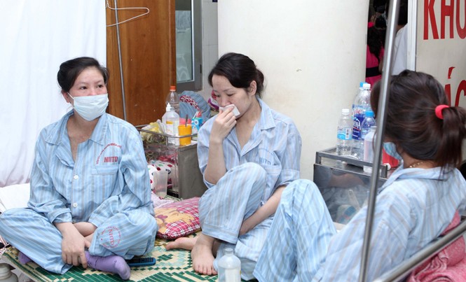 Nguy cơ virus cúm biến đổi độc lực Các bác sĩ khuyến cáo, người bị cúm nên chủ động hạn chế đến chỗ đông người, đeo khẩu trang đúng quy cách. Ảnh: Như Ý.