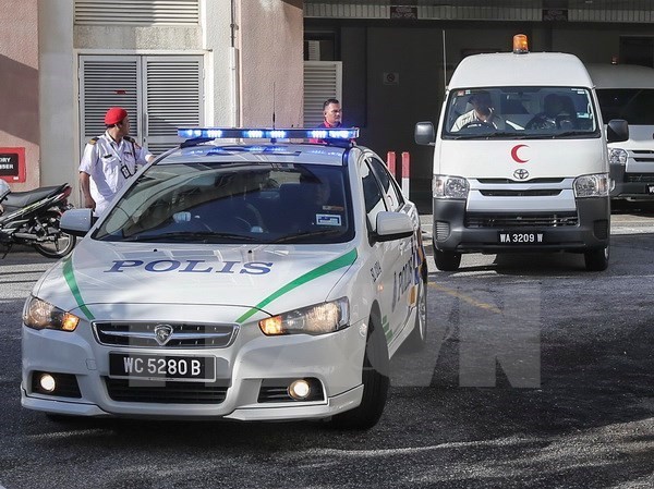 Malaysia đổi thi thể người Triều Tiên lấy công dân mắc kẹt Xe cảnh sát và xe cứu thương mang thi thể ông Kim Jong-nam rời bệnh viện ở Putrajaya, Malaysia ngày 15/2. (Nguồn: EPA/TTXVN)