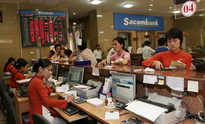 Tái cơ cấu Sacombank: Ngân hàng Nhà nước ráo riết xử lý tồn đọng Vấn đề cốt lõi của Sacombank là phải xử lý cho được “khối” tài sản tồn đọng gồm cổ phiếu và bất động sản cầm cố. Ảnh: Như Ý.