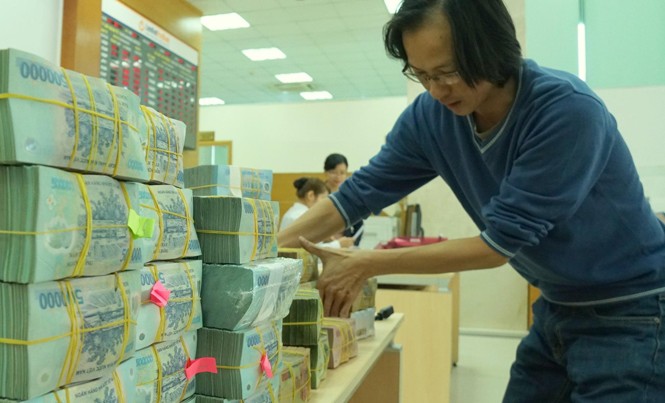 Ngân hàng “đánh vật” xử lý nợ xấu Giới ngân hàng vẫn đang gian nan xử lý nợ xấu.