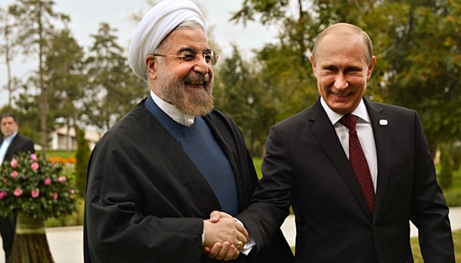 Nga và Iran chiến thắng phương Tây tại Syria Tổng thống Nga Vladimir Putin và Tổng thống Iran Hassan Rouhani. Ảnh: Getty Images
