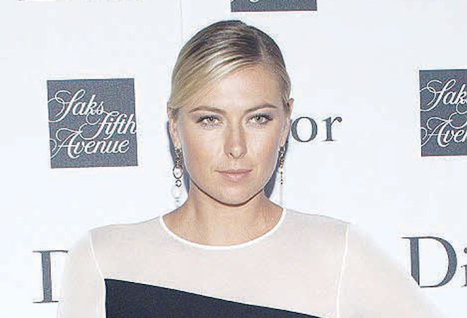 Thế giới 'chia rẽ' vì Búp bê Nga Sharapova Maria Sharapova bằng tài năng và sắc đẹp của mình có được rất nhiều hợp đồng quảng cáo với các nhãn hiệu hàng đầu thế giới. Ảnh: GETTY IMAGES