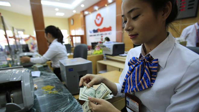 Biến động tỷ giá: Do kỳ vọng USD tăng giá? Giá USD trên thị trường đã có một tuần biến động. Ảnh: Như Ý