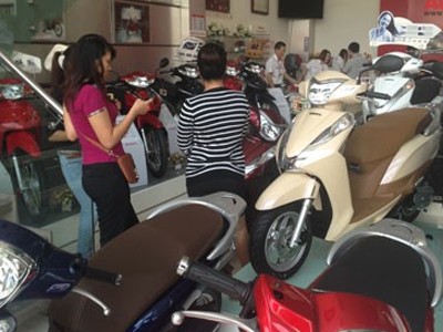 Xe máy vẫn là phương tiện chính tại Việt Nam Xe máy vẫn là phương tiện chính tại Việt Nam