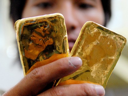 Vàng trong nước giữ giá, thế giới giảm Vàng trong nước giữ giá, thế giới giảm