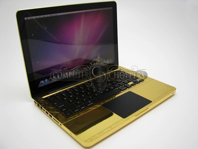 Laptop dát vàng 24 carat và kim cương Laptop dát vàng 24 carat và kim cương
