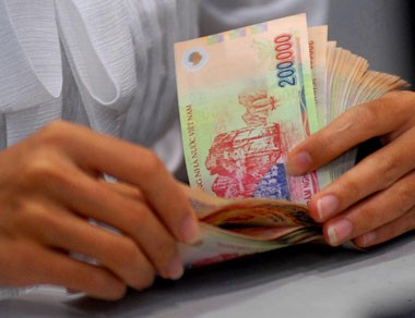 Từ 11-6: Lãi suất huy động giảm về 9%/năm Từ 11-6: Lãi suất huy động giảm về 9%/năm